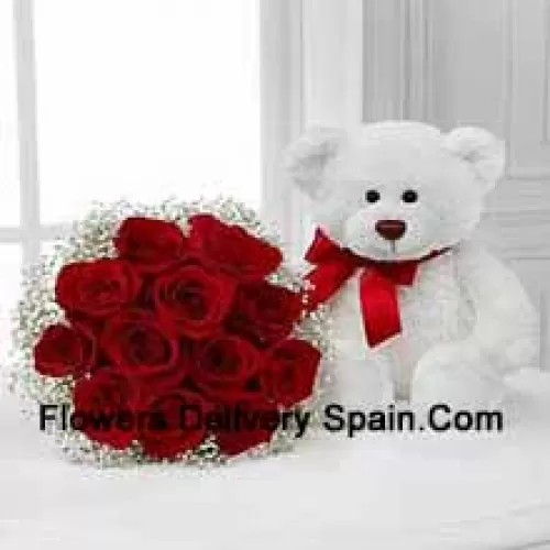 Bouquet de 11 roses rouges avec des remplissages saisonniers accompagné d'un mignon ours en peluche blanc de 14 pouces de hauteur