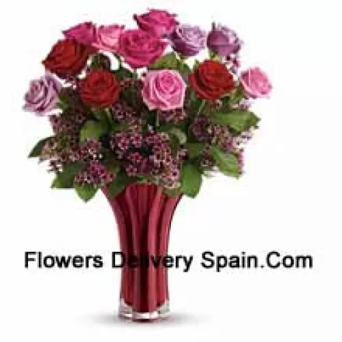 11 Mixed Colored Roses With Some Ferns in A Vase