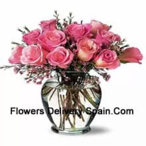 11 Pink Roses With Some Ferns In A Vase