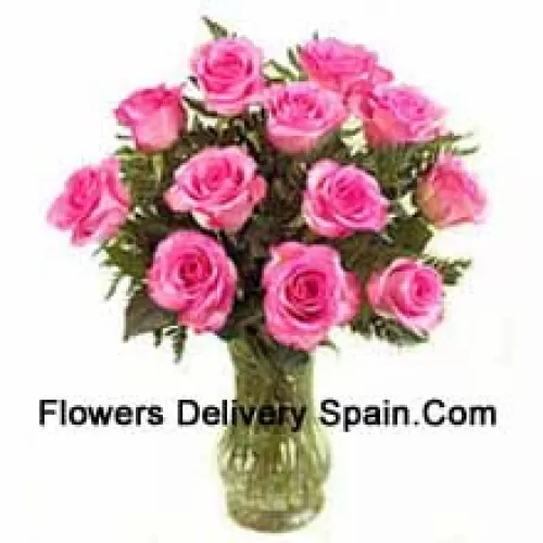 11 Pink Roses With Some Ferns In A Vase